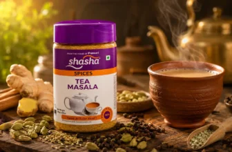 Shasha Tea Masala pack with steaming masala chai and traditional Indian spices including cardamom, cinnamon, cloves, ginger and fennel seeds
